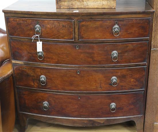 A Regency mahogany bow-fronted chest of five fitted drawers, on splayed feet, W.103cm